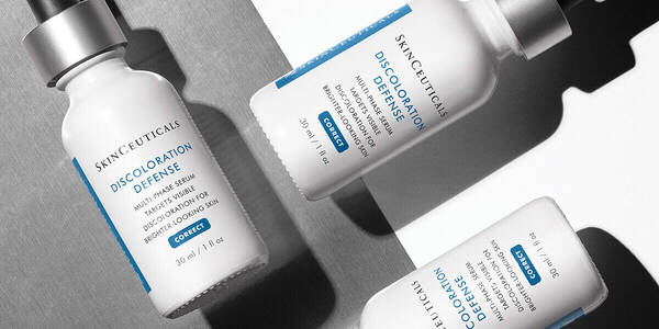 3-discoloration-defense-products-laying-on-a-table-multi-phase-serum